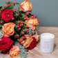 Roses, Hypericum and Eucalyptus with Candle