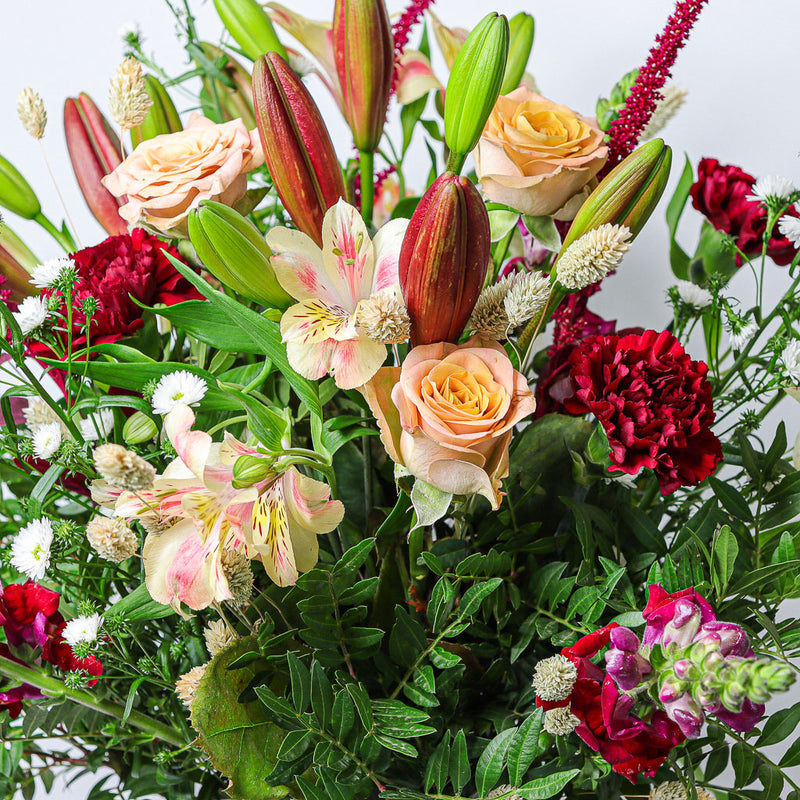 Red Lillies, Coffee Roses, Amaranthus and Snapdragons