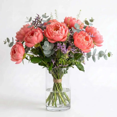 Coral peonies and limonium hand-tied bouquet - The Blossomist