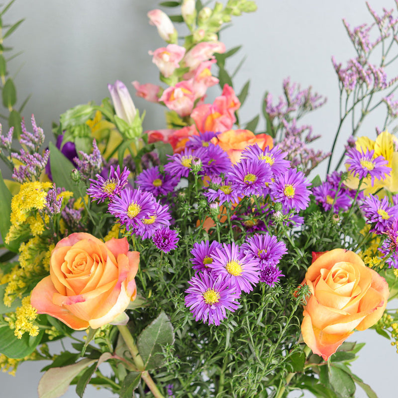 Orange Roses, Aster, Snapdragons and Solidago