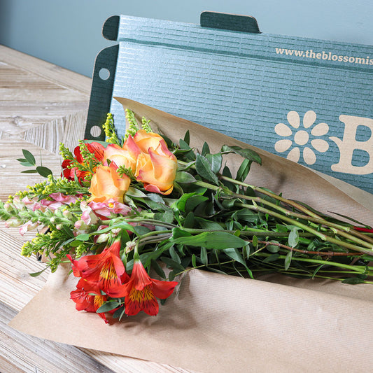 Orange Roses, Snapdragons, Alstroemeria and Solidago