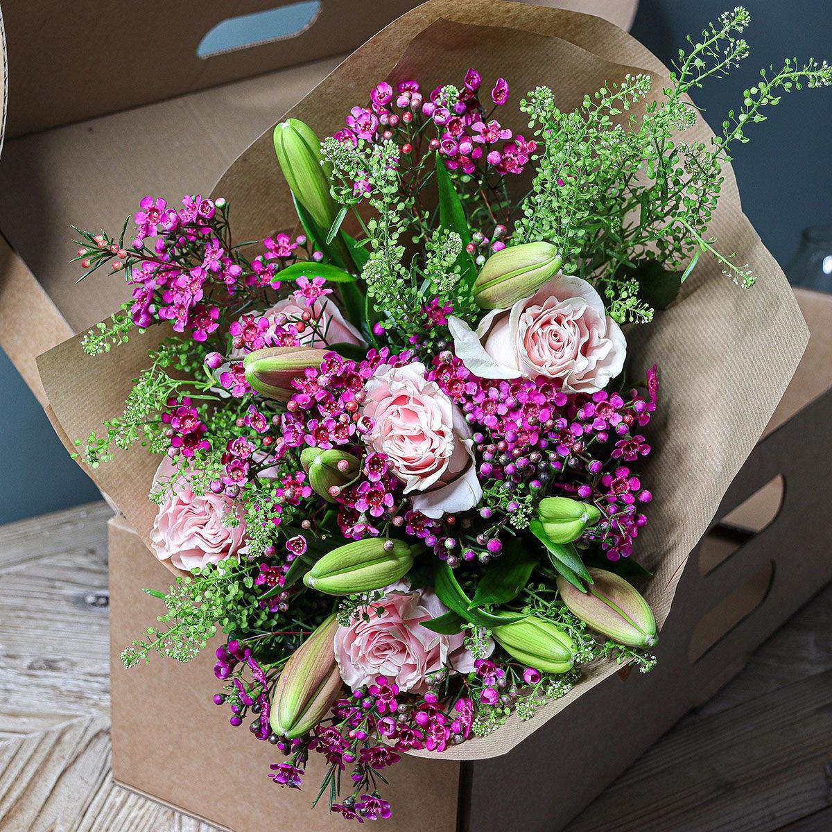 Pink Lilies, Pink Roses, Alstroemeria and Waxflower Bouquet - The Blossomist