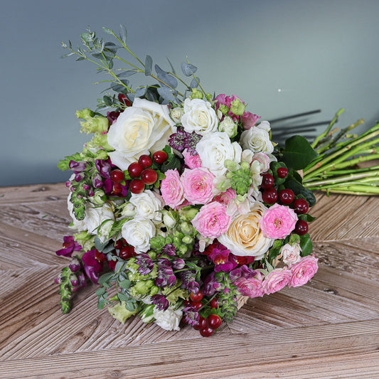 Roses, Spray Roses, Hypericum, Snapdragons and Lisianthus