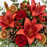 Close up of the The Mulberry Christmas flowers arranged in a vase