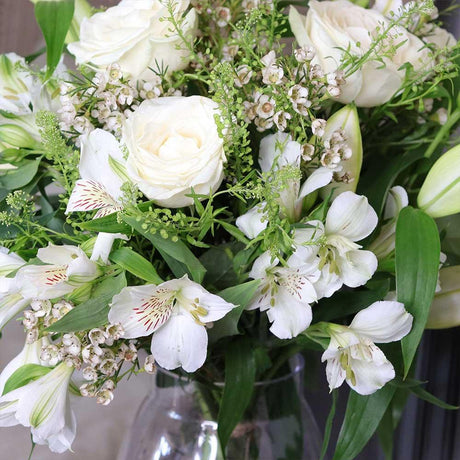 White Oriental Lilies, White Roses, Waxflower and Alstroemeria